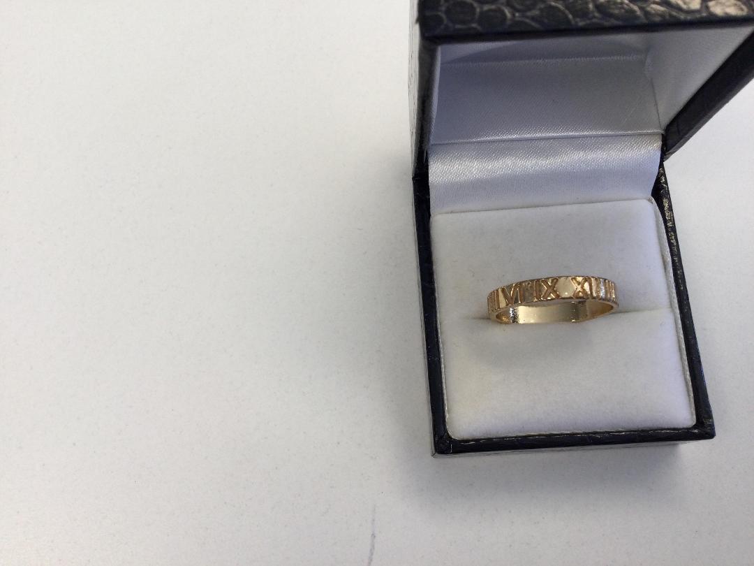 Photo '2' of Gold coloured ring with Clear Stone