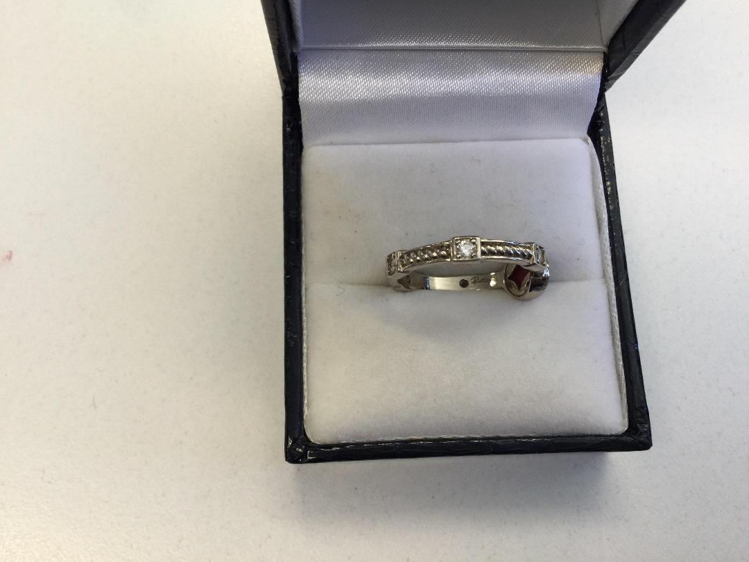 Photo '4' of Silver Coloured Ring with red and clear stones
