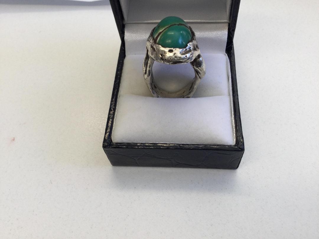Photo '2' of Silver Coloured Ring with Green coloured stone