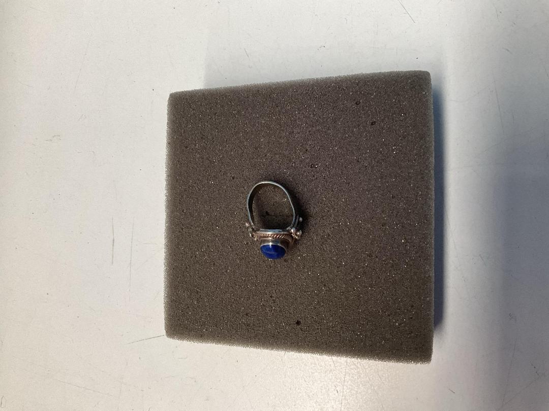 Photo '2' of Silver Coloured Ring with Blue Coloured Stone - Ring Bent Out of Shape