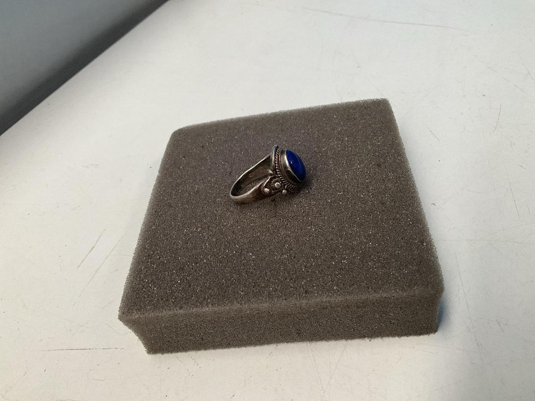 Photo '3' of Silver Coloured Ring with Blue Coloured Stone - Ring Bent Out of Shape