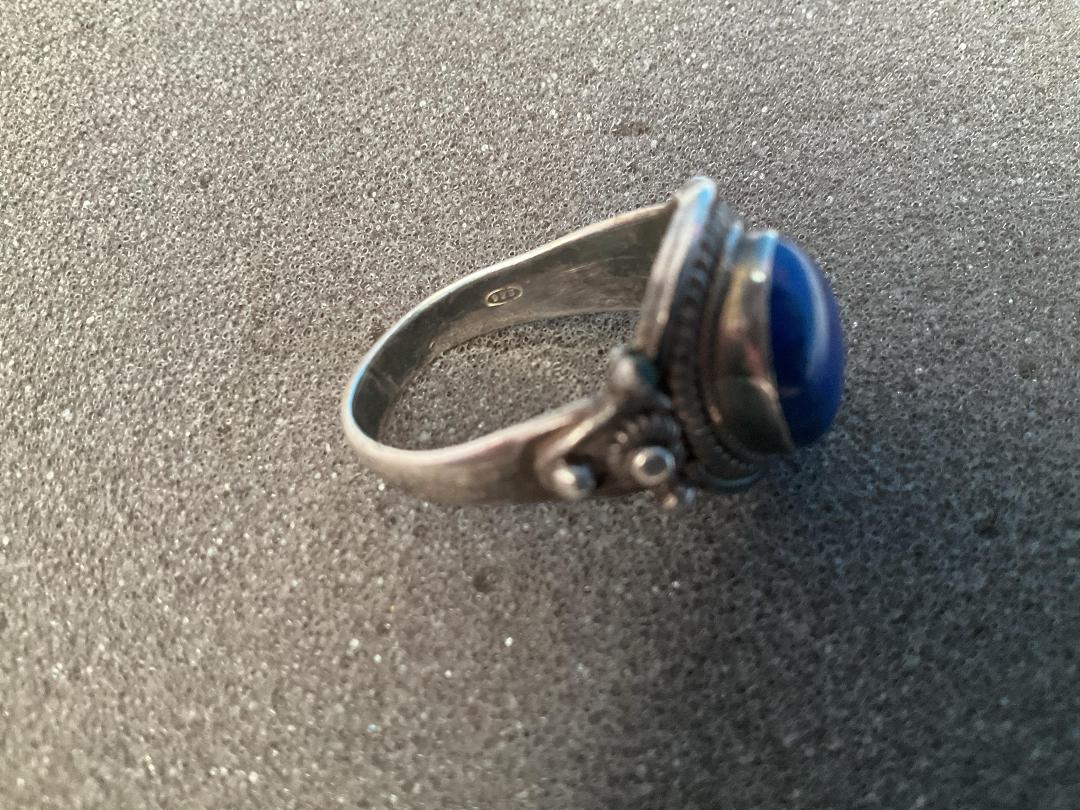 Photo '8' of Silver Coloured Ring with Blue Coloured Stone - Ring Bent Out of Shape