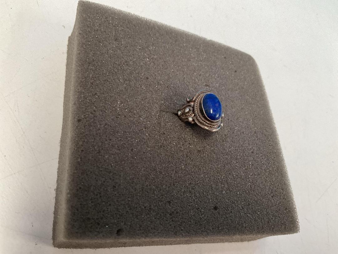 Photo '10' of Silver Coloured Ring with Blue Coloured Stone - Ring Bent Out of Shape