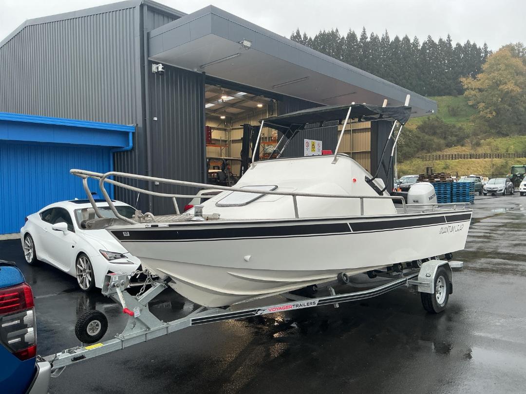 Photo '7' of Aluminum boat, 90HP Honda with Voyager Trailer