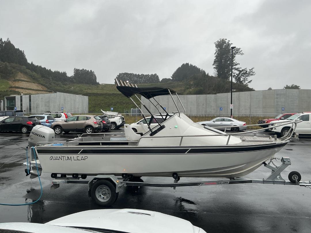 Photo '2' of Aluminum boat, 90HP Honda with Voyager Trailer