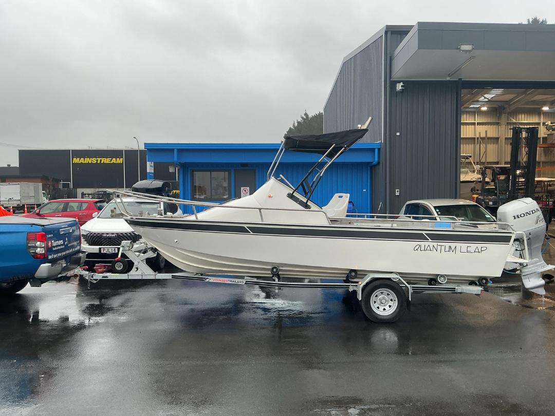 Photo '6' of Aluminum boat, 90HP Honda with Voyager Trailer