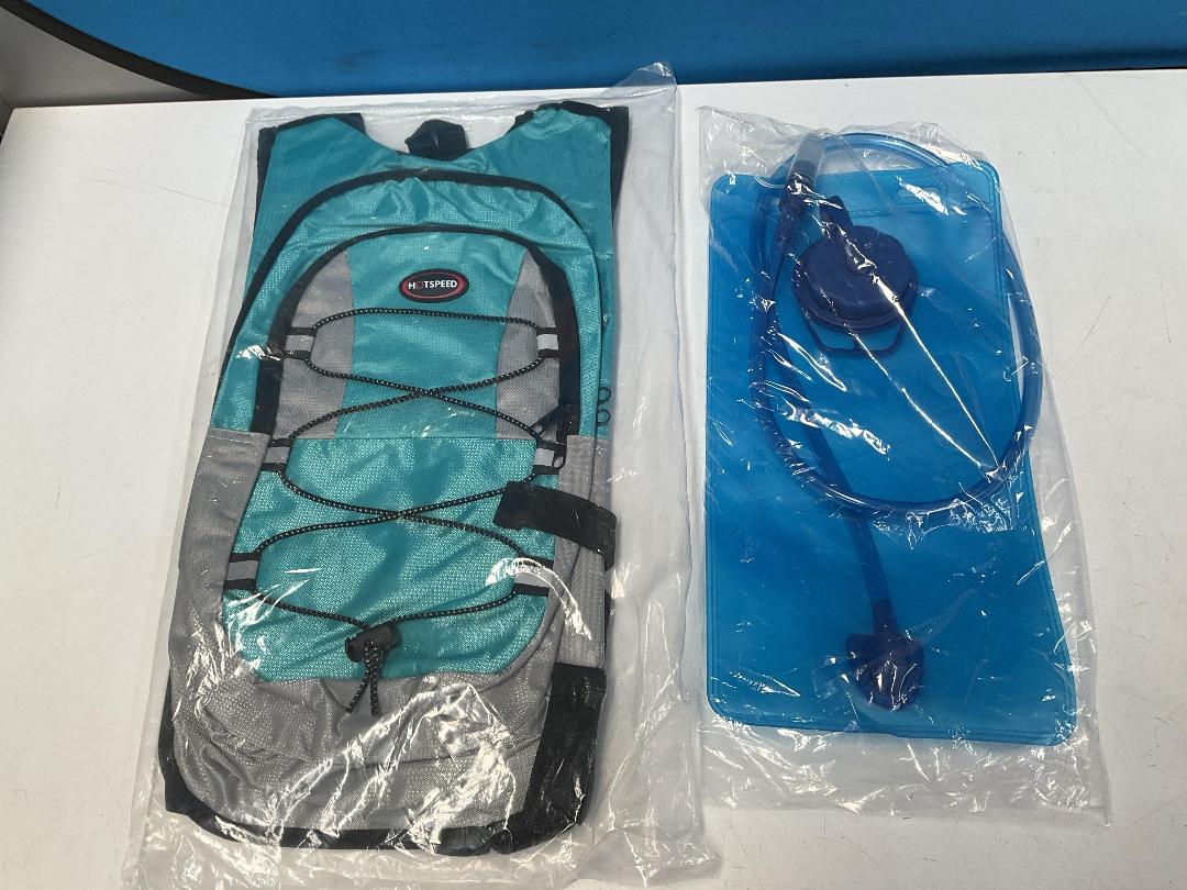 Photo '2' of 3x HotSpeed - Hydration Packs & 3x 2L Bladders - Aqua *NEW* Photo '2' of 3x HotSpeed - Hydration Packs & 3x 2L Bladders - Aqua *NEW*